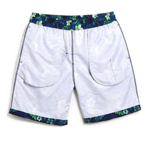 Men's Dark Green Leaves Print Beach Board Shorts